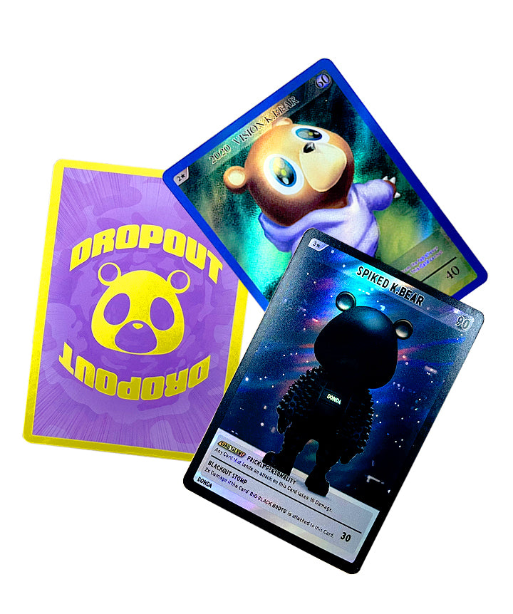 Two trading cards featuring cartoon bears with a 'Dropout' branded card in the background.